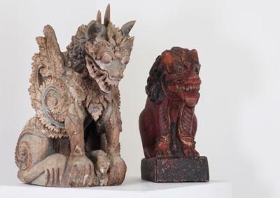 Lot 233 - A carved figure of a temple guardian