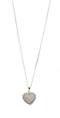 Lot 147 - A white gold diamond set heart pendant