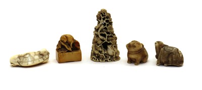 Lot 134 - A group of five Japanese ivory carved netsukes