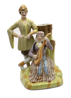 Lot 188 - A glazed Gardner porcelain figure group
