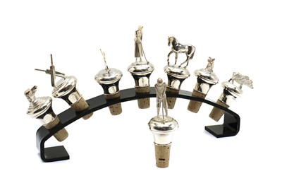 Lot 26 - A group of eight modern silver novelty bottle stoppers