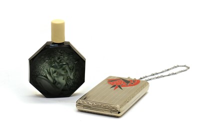 Lot 12 - A white metal and enamel compact