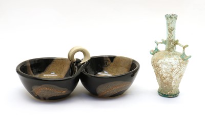 Lot 186 - A Roman style green glass amphora