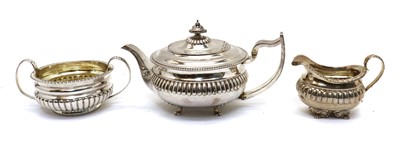 Lot 44 - A composed silver three piece tea service