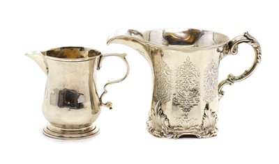 Lot 20 - Two silver cream jugs