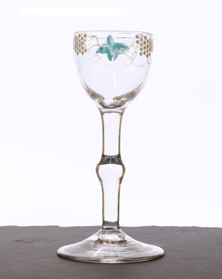 Lot 341 - A Beilby polychrome enamelled wine glass