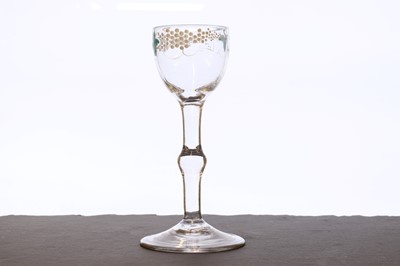 Lot 341 - A Beilby polychrome enamelled wine glass