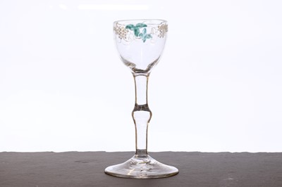 Lot 341 - A Beilby polychrome enamelled wine glass