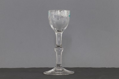 Lot 341 - A Beilby polychrome enamelled wine glass