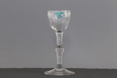 Lot 341 - A Beilby polychrome enamelled wine glass