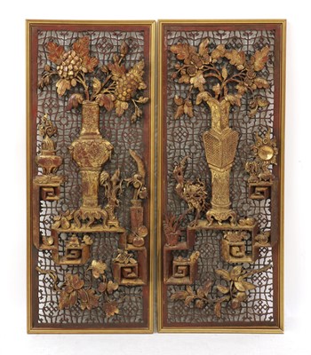 Lot 117 - A pair of Chinese gilt lacquered wood panels
