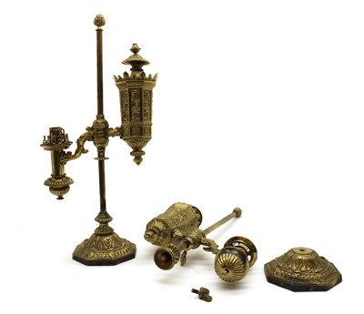 Lot 167 - A pair of Louis Philippe pressed brass Argand student lamps