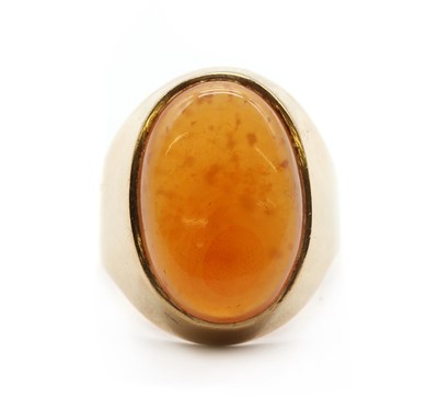 Lot 206 - A gold single stone cornelian ring