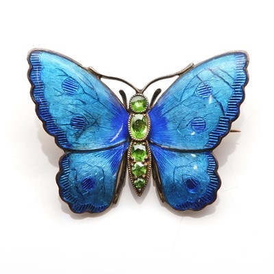 Lot 74 - A silver gilt demantoid garnet and enamel butterfly brooch, by Child  & Child, c.1905