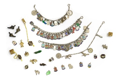 Lot 446 - Four silver charm bracelets