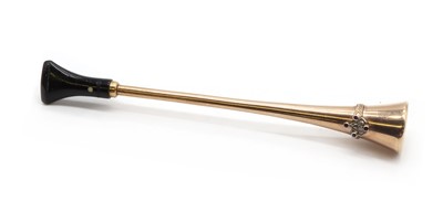 Lot 60 - A Dunhill gold cased ruby and diamond set cigarette holder