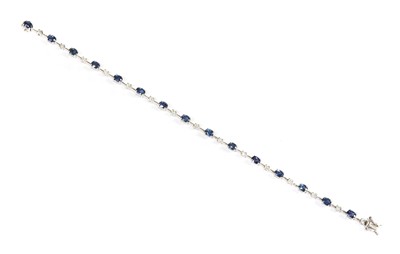 Lot 264 - A white gold sapphire and diamond bracelet