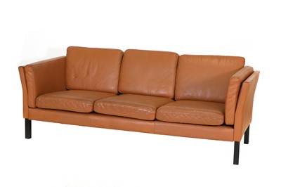 Lot 372 - A Danish tan leather three-seater settee