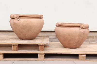 Lot 250 - A pair of composition stone scroll pots