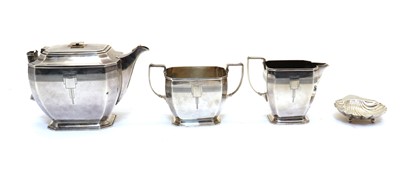 Lot 24 - A silver three piece tea service