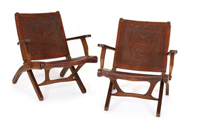 Lot 400 - A pair of hardwood and leather folding chairs