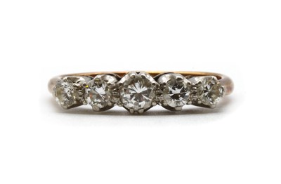 Lot 112 - A gold five stone diamond ring