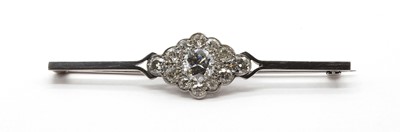 Lot 57 - A diamond lozenge cluster bar brooch