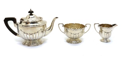 Lot 8 - A silver three piece tea service