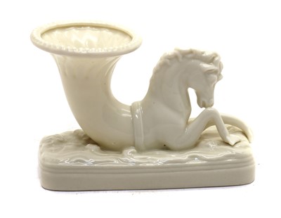 Lot 74 - A Belleek pottery seahorse cornucopia