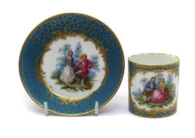 Lot 76 - A Sèvres style porcelain cup and saucer