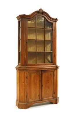 Lot 511 - A stripped pine cabinet