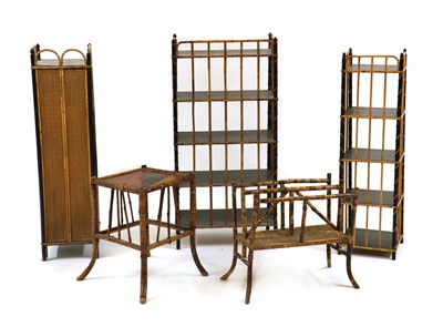 Lot 491 - An ebonised and bamboo four-tier étagère