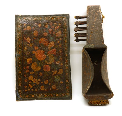 Lot 221 - A Qajar lacquered papier-mâché panel