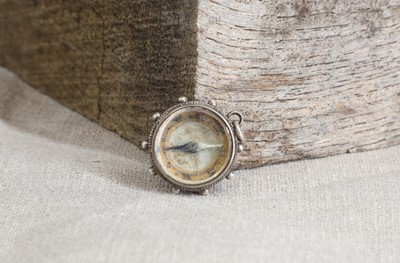 Lot 41 - Early cycling interest: an unusual silver watch-fob-suspended compass
