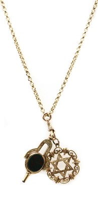 Lot 482 - A gold mounted pocket watch key swivel fob