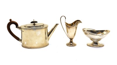 Lot 2 - A George III style silver three piece tea service