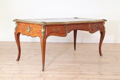 Lot 287 - A Louis XV-style kingwood bureau plat