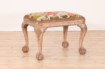 Lot 209 - A George II-style carved walnut stool