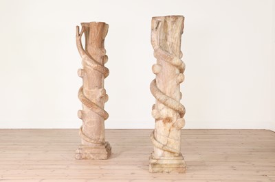 Lot 104 - A pair of alabaster jardinière stands