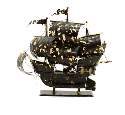 Lot 257 - A Japanase toirtoseshell okimono