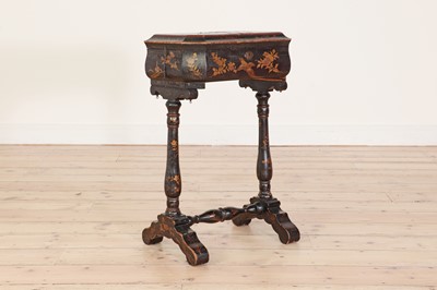 Lot 171 - A chinoiserie lacquered worktable