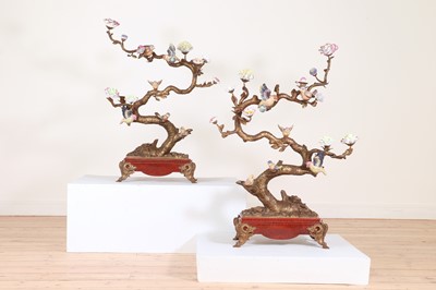 Lot 33 - A pair of large gilt-metal and porcelain candelabra in the Chinese style