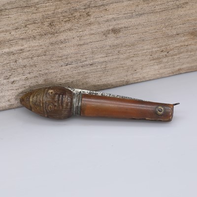 Lot 33 - An unusual pressed horn figural pocket knife