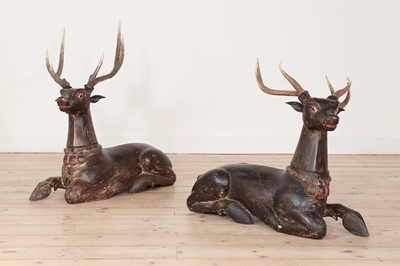 Lot 422 - A pair of painted deer
