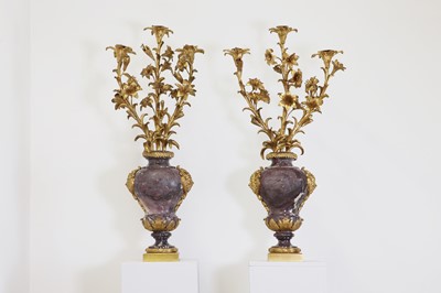 Lot 261 - A pair of brèche violette and ormolu candelabra