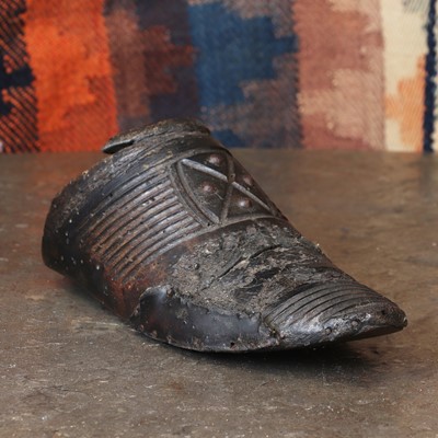 Lot 55 - A carved wooden clogmaker's pattern sample