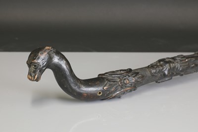 Lot 12 - A carved folk art bog oak walking stick