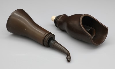 Lot 24 - A pair of gutta-percha telescopic hearing aids