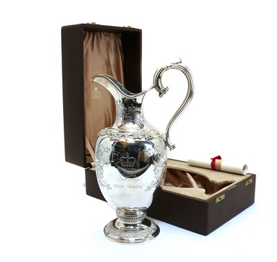 Lot 50 - A commemorative silver claret jug