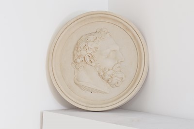 Lot 380 - A Coade-style cast composition roundel of Hercules
